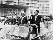 Léopold Sédar Senghor and Mamadou Dia, the first President and Prime Minister respectively of the Republic of Senegal, pass the National Assembly building in Dakar, 1960