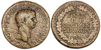 Roman sestertius issued during Claudius' reign. The reverse reads "EX SC PP OB CIVES SERVATOS", meaning "Senatus Consulto" (approved by the Senate), "Pater Patriae" (to the father of his country), "Ob Cives Servatos" (For having saved the citizens).