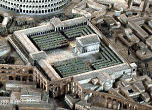 Model of ancient Rome showing the Temple of Claudius, built by Vespasian. The Aqua Claudia aqueduct runs next to it, and the Colosseum sits adjacent.
