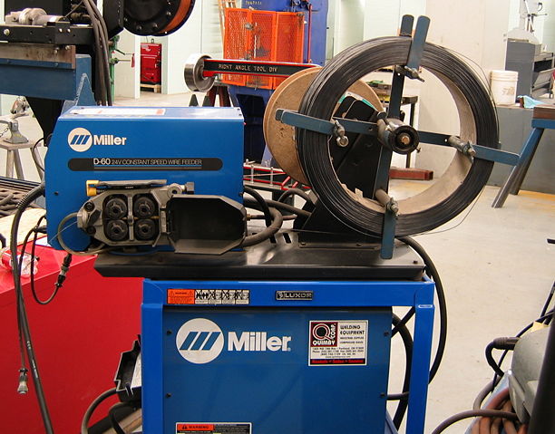 Image:Welding wire feeder-Miller-D60-side-triddle.jpg