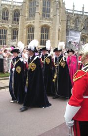 The Prince of Wales with his siblings the Princess Royal, the Earl of Wessex and the Duke of York, who are supernumerary members of the Order.