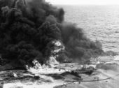 January 14: Explosion kills 27 on USS Enterprise