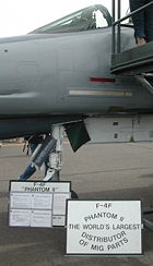 An F-4F on display described as the "World's largest distributor of MiG parts", because of the high number of this type of enemy aircraft shot down