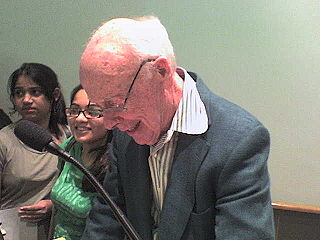 Watson signing autographs after a speech at Cold Spring Harbor Laboratory on 30 April 2007.