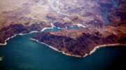 Aerial shot of Lake Mead and Hoover Dam showing the high-water mark of the 1983 flood season along the shore