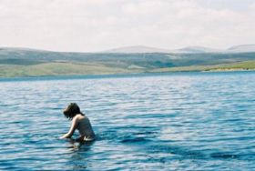 Cow Green Reservoir, with (l to r) Great Dun Fell, Little Dun Fell and Cross Fell in the background at a distance of about 10 km