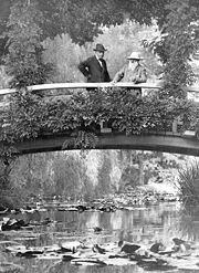 Monet, right, in his garden at Vernon, 1922.