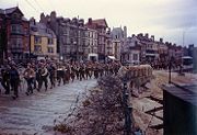 U.S. soldiers of the 2nd Ranger Battalion march through Weymouth, a southern English coastal town, en route to board landing ships for the invasion of France.