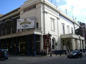 The theatre today. The sign for The Producers faces Russell Street; the front entrance is through the portico facing Catherine Street on the right.