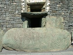 The sunlight enters the tomb at Newgrange via the roofbox built above the door.
