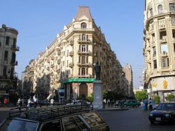 Old buildings in Downtown Cairo. In the center is the statue of Talaat Pasha Harb, the father of the modern Egyptian economy