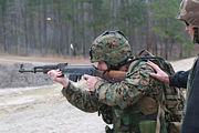 A U.S. Marine fires the AK-47.