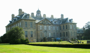 Belton House, the north facade.  The 17th-century double room design enabled greater symmetry between facades, while allowing the house to be compact and under the one roof.