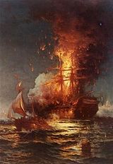 February 16: USS Philadelphia burns.