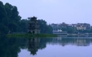 Hoàn Kiếm Lake in the centre of Hanoi, with the streets of the old town in the background (1999)
