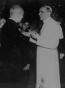 Pope Pius XII greets pilgrims during an audience in St. Peter Basilica