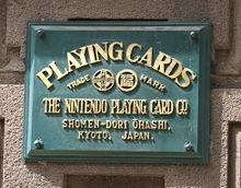Former headquarter plate from when Nintendo was solely a playing card company.
