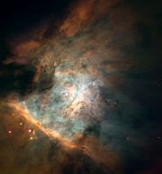 Panoramic image of the center of the nebula, taken by the Hubble Telescope. This view is about 2.5 light years across. The Trapezium is at center left. Credit:NASA/ESA.
