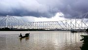 Monsoon clouds over Howrah Bridge.