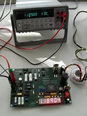 Commercial digital voltmeter checking a prototype