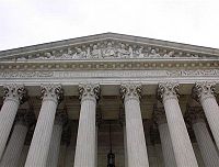 The words inscribed above the entrance to the U.S. Supreme Court are: "Equal justice under law"