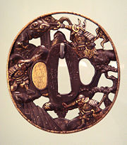 Decorated sword guard, or tsuba.