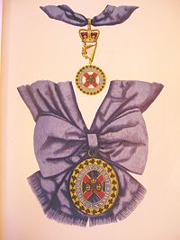 The badge of the Order. The statutes of the Order prescribed a sky-blue riband; the exact shade of blue used varied over time.