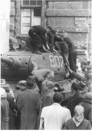 Hungarians inspect a T-34-85 in Budapest, during the 1956 Revolution