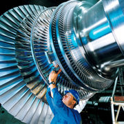 A rotor of a modern steam turbine, used in a power plant