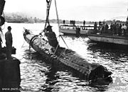 June 1, 1942. A Japanese Ko-hyoteki class midget submarine, believed to be Midget No. 14, is raised from Sydney Harbour