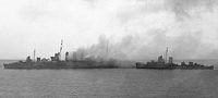 American destroyers evacuating the crew of HMAS Canberra after the Battle of Savo Island