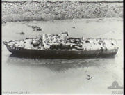 HMAS Arrow after being re floated from under Stokes Hill Wharf, she was later scraped