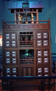 A scale model of Su Song's Astronomical Clock Tower, built in 11th century Kaifeng, China. It was driven by a large waterwheel, chain drive, and escapement mechanism.