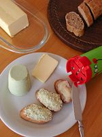 Zigerbrüt, cheese grated onto bread through a special mill, Switzerland.