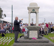 The Last Post is played at an ANZAC Day ceremony in Port Melbourne, Victoria, 25 April 2005. Such ceremonies are held in virtually every suburb and town in Australia.