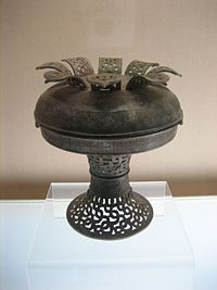 Chinese pu vessel with interlaced dragon design, Spring and Autumn Period.