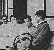 Hochreit 1920. Wittgenstein is seated between his sister Helene Salzer and his friend, Arvid Sjögren.