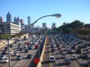 The Downtown Connector, with the downtown skyline in the background