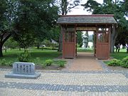 Canberra-Nara park with Kasuga stone lantern framed by the gate