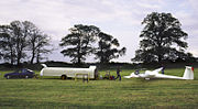 Pilot and crew about to de-rig a glider