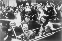 President Kennedy with his wife, Jacqueline, and Texas Governor John Connally in the presidential limousine shortly before his assassination