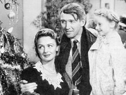 Stewart, Karolyn Grimes and Donna Reed in It's a Wonderful Life.