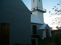 Saint Peter's Church, in St. George's, Bermuda, is the oldest Church of England (now Anglican) church outside the British Isles. Consecrated in 1612, it was rebuilt more than once.