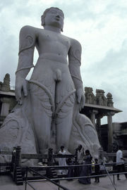 The 17.8 m monolith of Jain Tirthankara Bhagavan Gomateshwara Bahubali, which was carved between 978–993 AD and is located in Shravanabelagola, India, is anointed with saffron every 12 years by thousands of devotees as part of the Mahamastakabhisheka festival.