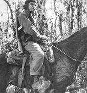 Riding a mule in Las Villas province, Cuba, November 1958