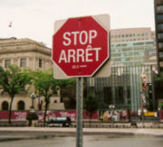 Bilingual (English/French) stop sign on Parliament Hill in Ottawa. An example of bilingualism at the federal government level in Canada.