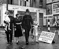 Post-WWII: Walking Past an Unexploded Bomb