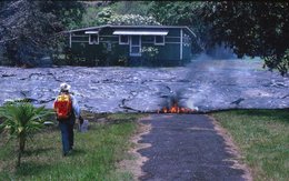 Lava can easily destroy entire towns. This picture shows one of over 100 houses destroyed by the lava flow in Kalapana, Hawaiʻi, United States, in 1990.