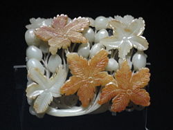 Chinese Jade ornament with flower design, Jin Dynasty (1115-1234 AD), Shanghai Museum.