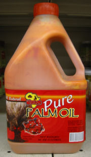 Palm oil from Ghana with its natural dark colour visible, 2 litres